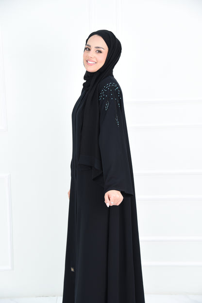 عباية كلوش كريب بتطريز تركواز على الاكتاف