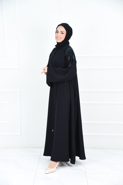 عباية كلوش كريب بتطريز تركواز على الاكتاف